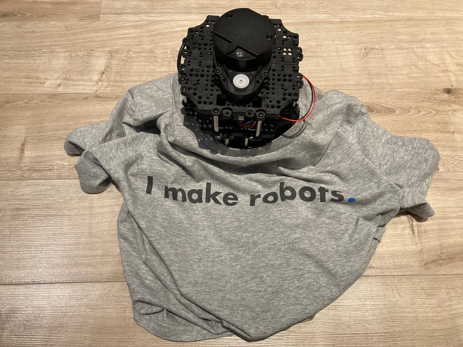 Turtlebot wearing T-shirt 'I make robots'