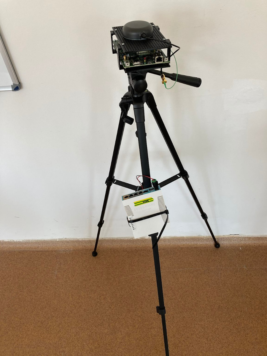 Tripod with base module and router
